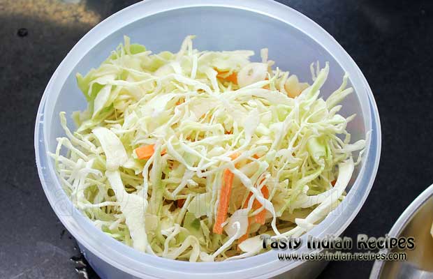 In a bowl shred the Cabbage finely In a bowl shred the Cabbage finely