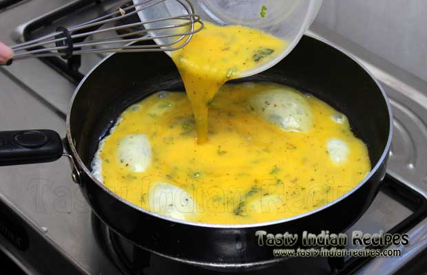 Pour the egg mixture into the pan and spread evenly